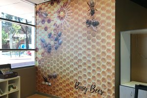Imagesource can provide a design for your wall graphics or can print the wall graphics with your custom design just like this wall paper for Busy Bees.