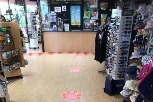 Floor signage for the Perth Zoo gift shop - paw print shape social distancing decals are super eye-catching