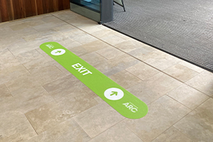 Floor graphics are an effective signage solution for businesses wanting to direct pedestrians or foot traffic